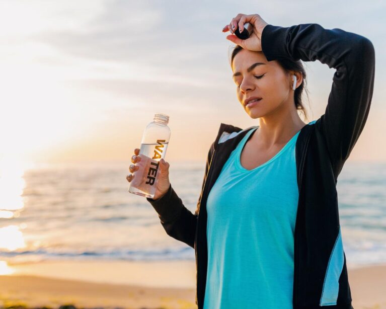 Doctor explaining electrolyte imbalance symptoms and hydration during summer