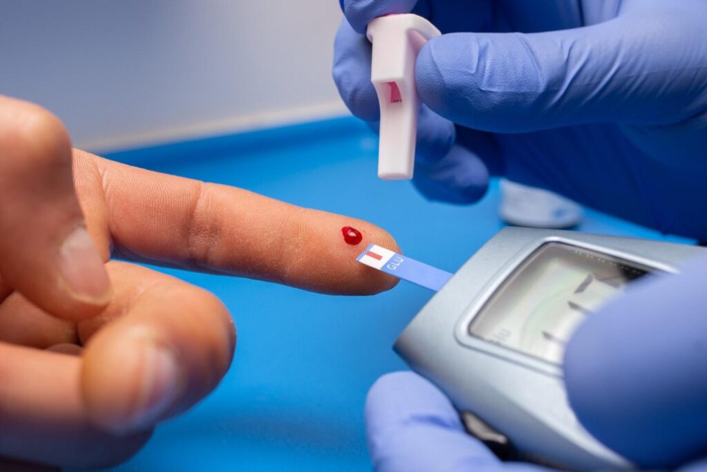 Doctor advising a patient on managing blood sugar during extreme heat