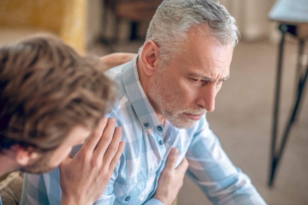 Cardiologist advising a patient on preventing hot weather heart problems