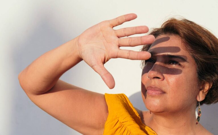 Long-term effects of UV exposure on skin including premature aging and sun damage