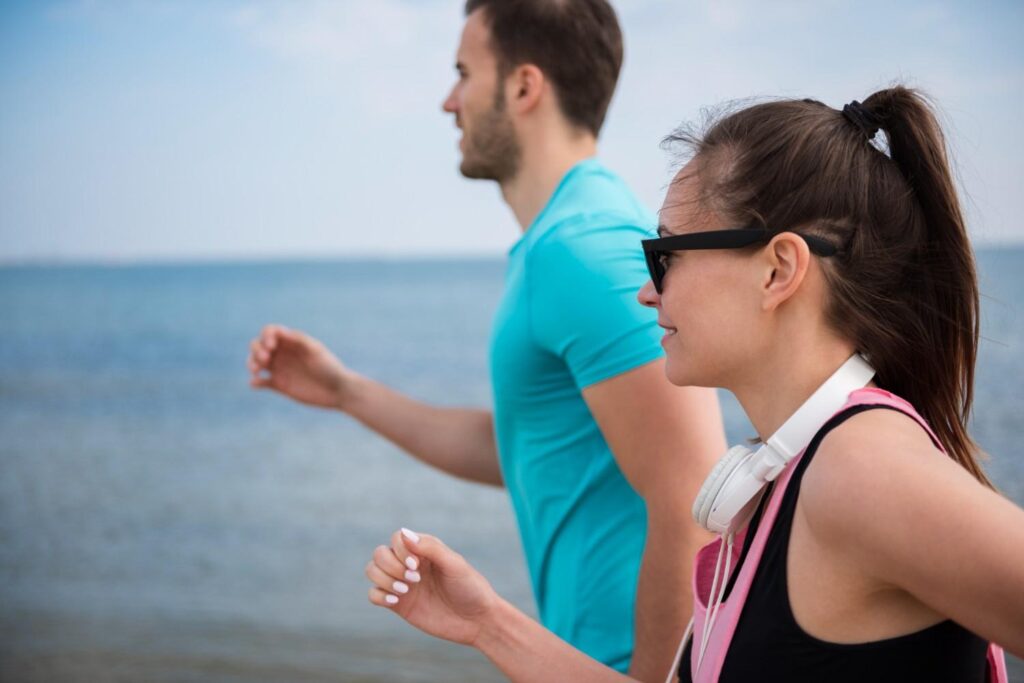Person exercising safely outdoors while avoiding heat-related risks