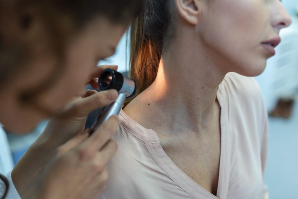 Dermatologist performing a skin examination for early skin cancer detection