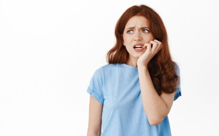 Young woman consulting a dentist about premature tooth loss and oral health.