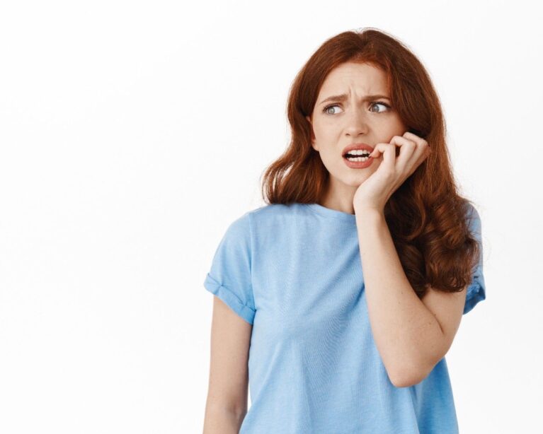 Young woman consulting a dentist about premature tooth loss and oral health.