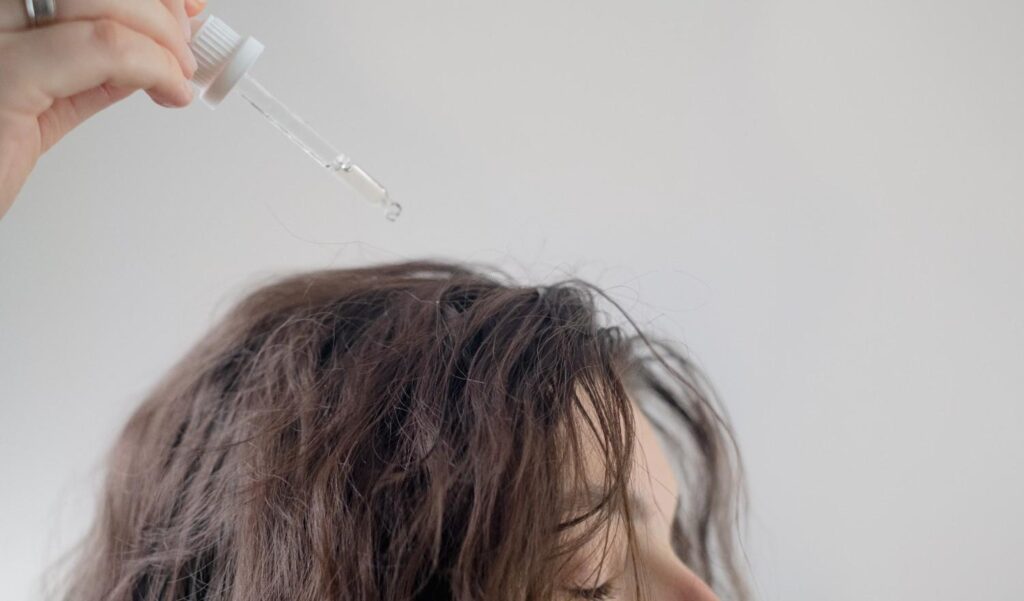 Dermatologist examining hair and scalp health