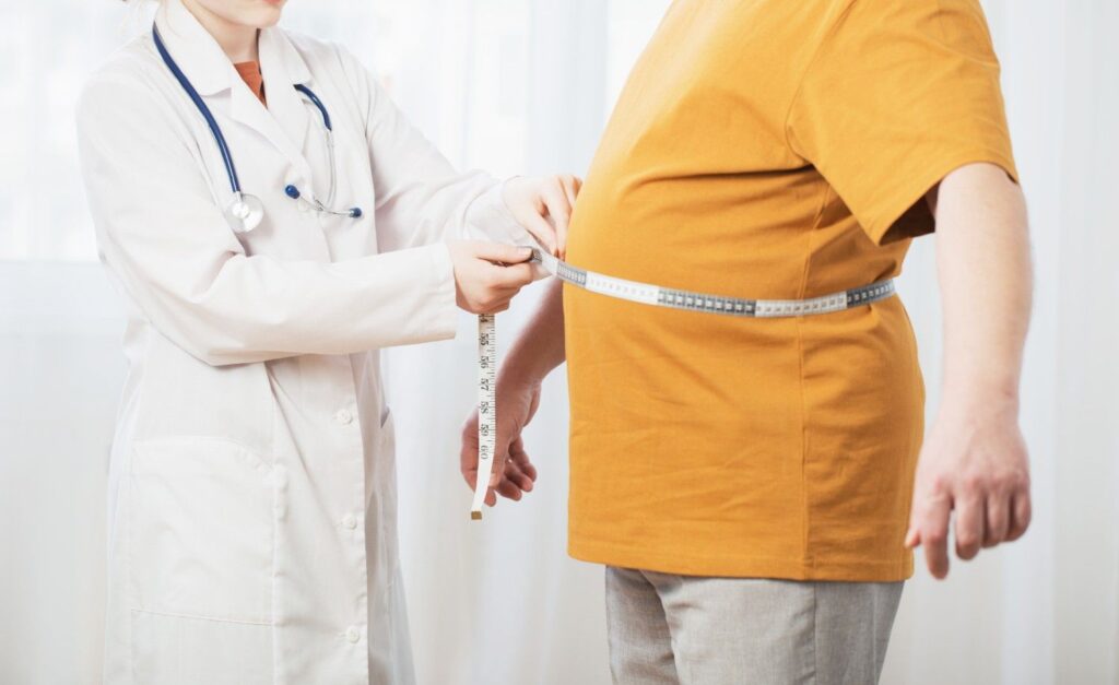 Doctor discussing obesity treatment with a patient