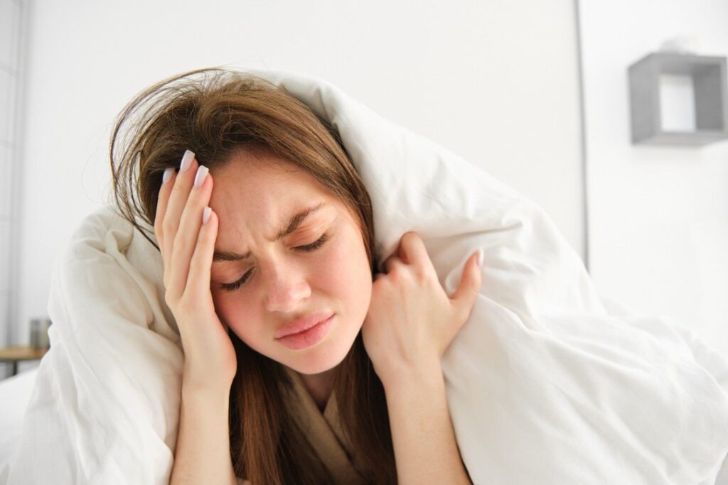 Person experiencing sleep-related neurological symptoms
